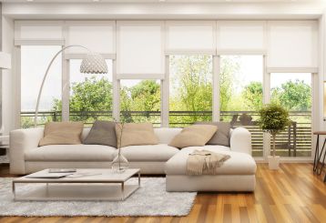 Cordless blinds and shades gracefully installed on a window, enhancing the room's aesthetic.