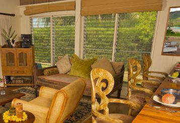 Elegant woven wood blinds installed on a living room window.